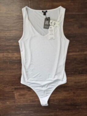 White thong body suit